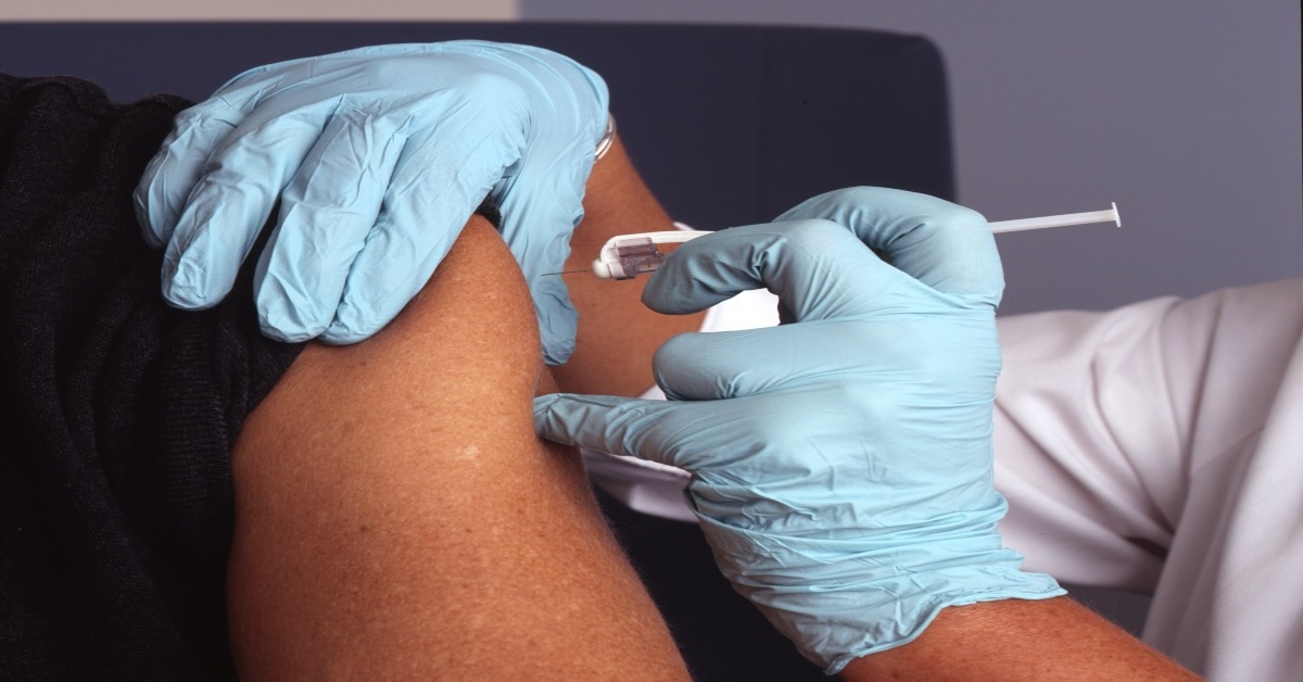 Person getting the Hepatitis B vaccine in their arm.